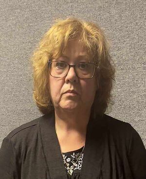 This June 6, 2023, booking photo released by the Marion County Sheriff's Office in Ocala Florida, shows Susan Lorincz. Lorincz, 58, was arrested June 6 in Florida, four days after she shot through her door and killed Ajike Owens, 35, a Black mother, in a neighborhood dispute, police said. Lorincz is charged with manslaughter with a firearm and faces 30 years in prison, said the Marion County Sheriff's Department, which was criticized for delaying the arrest of the suspect.
On the evening of June 2, Lorincz shot through the door of her Ocala apartment, killing Owens, in a long-running dispute over her four children, according to the sheriff's release. (Photo by Handout / Marion County Sheriff's Office / AFP) / RESTRICTED TO EDITORIAL USE - MANDATORY CREDIT "AFP PHOTO / Marion County Sheriff's Office" - NO MARKETING NO ADVERTISING CAMPAIGNS - DISTRIBUTED AS A SERVICE TO CLIENTS