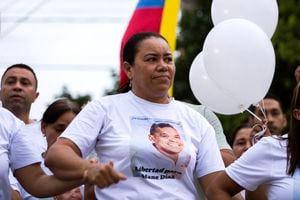 Cilenis Marulanda, mother of Colombian soccer player Luis Diaz, joins a march to demand the release of her husband and the father of the Liverpool striker, in Barrancas, La Guajira department, Colombia, Tuesday, Oct. 31, 2023. The parents of the 26-year-old Diaz were reportedly kidnapped as they drove to their home. Marulanda was rescued by police in Barrancas, Colombia’s President Gustavo Petro said. (AP Photo/Leo Carrillo)