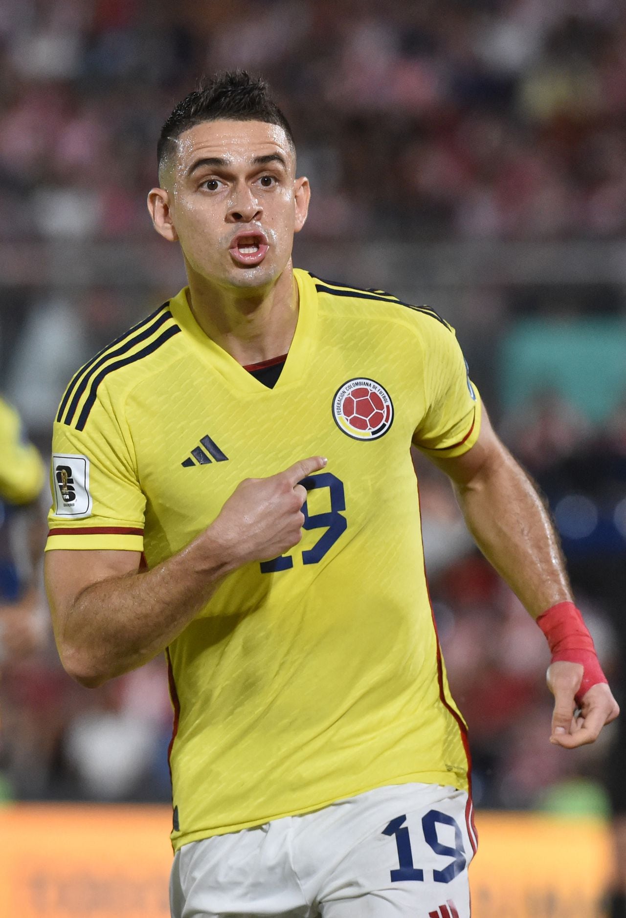 Colombia's forward Rafael Santos Borre celebrates after scoring a penalty during the 2026 FIFA World Cup South American qualifiers football match between Paraguay and Colombia at the Defensores del Chaco stadium in Asuncion on November 21, 2023. (Photo by NORBERTO DUARTE / AFP)