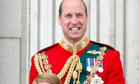 LONDON, UNITED KINGDOM - JUNE 02: (EMBARGOED FOR PUBLICATION IN UK NEWSPAPERS UNTIL 24 HOURS AFTER CREATE DATE AND TIME) Prince George of Cambridge and Prince William, Duke of Cambridge watch a flypast from the balcony of Buckingham Palace during Trooping the Colour on June 2, 2022 in London, England. Trooping The Colour, also known as The Queen's Birthday Parade, is a military ceremony performed by regiments of the British Army that has taken place since the mid-17th century. It marks the official birthday of the British Sovereign. This year, from June 2 to June 5, 2022, there is the added celebration of the Platinum Jubilee of Elizabeth II in the UK and Commonwealth to mark the 70th anniversary of her accession to the throne on 6 February 1952. (Photo by Max Mumby/Indigo/Getty Images)