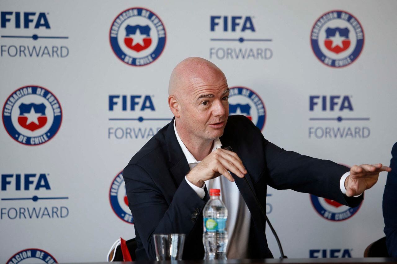 On this handout picture released by Chile's National Professional Football Association (ANFP) FIFA president Gianni Infantino speaks during a press conference in Santiago, on October 17, 2021. Infantino arrived to Santiago on an official visit of 20 hours, in which he will review the news of Chilean football and the projects aimed at developing the football activity.
Carlos PARRA / ANFP / AFP