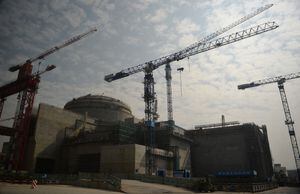 (FILES) This file photo taken on December 8, 2013 shows a view of the joint Sino-French Taishan Nuclear Power Station being built outside the city of Taishan in Guangdong province. - French nuclear firm Framatome said on June 14, 2021 it was working to resolve a "performance issue" at the plant it part-owns in China's southern Guangdong province following a US media report of a potential leak there. (Photo by PETER PARKS / AFP)