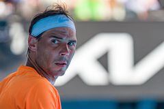 MELBOURNE, AUSTRALIA - JANUARY 16: Rafael Nadal of Spain looks on in the round one singles match against Jack Draper of Great Britain during day one of the 2023 Australian Open at Melbourne Park on January 16, 2023 in Melbourne, Australia. (Photo by Andy Cheung/Getty Images)