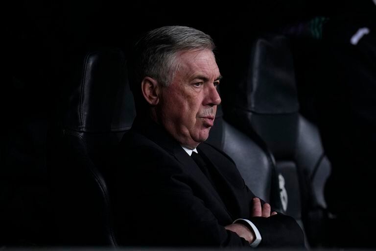 Real Madrid's head coach Carlo Ancelotti waits for the start of the Champions League, round of 16 second leg soccer match between Real Madrid and Liverpool at the Santiago Bernabeu stadium in Wednesday, March 15, 2023. (AP Photo/Manu Fernandez)