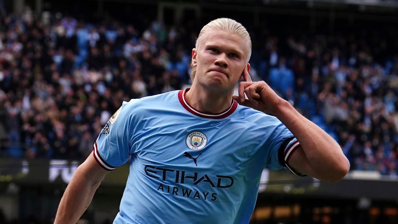 Manchester City's Erling Haaland celebrates after scoring his side's third goal during the English Premier League soccer match between Manchester City and Manchester United at Etihad stadium in Manchester, England, Sunday, Oct. 2, 2022. (Martin Rickett/PA via AP)