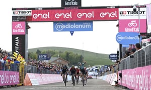 Australia's Jai Hindley crosses the finish line to win the 187-kilometer 9th stage of the Giro D'Italia cycling race from Isernia to Mt. Blockhaus, in central Italy, Sunday, May 15, 2022. (Gian Mattia D'Alberto/LaPresse via AP)