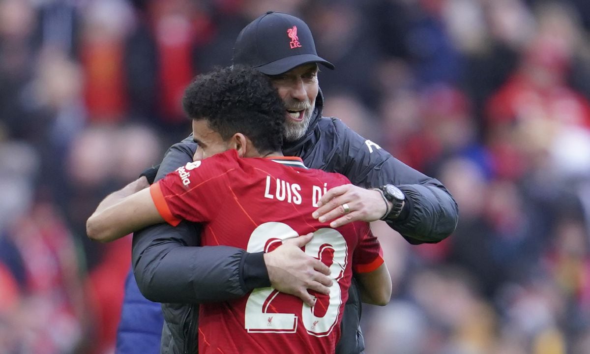 Liverpool's manager Jurgen Klopp embraces Liverpool's Luis Diaz after the FA Cup fourth round soccer match between Liverpool and Cardiff City at Anfield stadium in Liverpool, England, Sunday, Feb. 6, 2022. (AP/Jon Super)