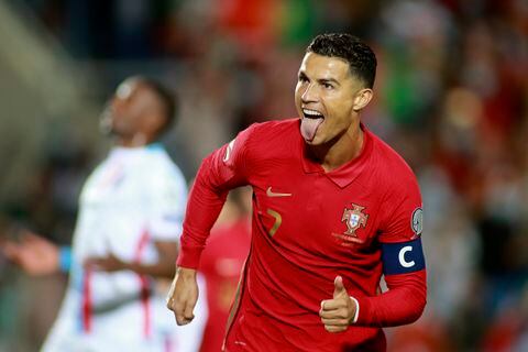 Portugal's Cristiano Ronaldo celebrates after scoring his side's second goal from the penalty spot during the World Cup 2022 group A qualifying soccer match between Portugal and Luxembourg at the Algarve stadium outside Faro, Portugal, Tuesday, Oct. 12, 2021. (AP Photo/Joao Matos)