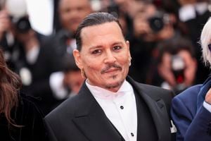 Johnny Depp poses for photographers upon arrival at the opening ceremony and the premiere of the film 'Jeanne du Barry' at the 76th international film festival, Cannes, southern France, Tuesday, May 16, 2023. (Photo by Vianney Le Caer/Invision/AP)