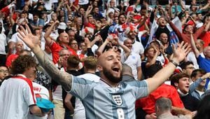 England supporters celebarate their opening goal during the UEFA EURO 2020 round of 16 football match between England and Germany at Wembley Stadium in London on June 29, 2021. (Photo by JUSTIN TALLIS / POOL / AFP)