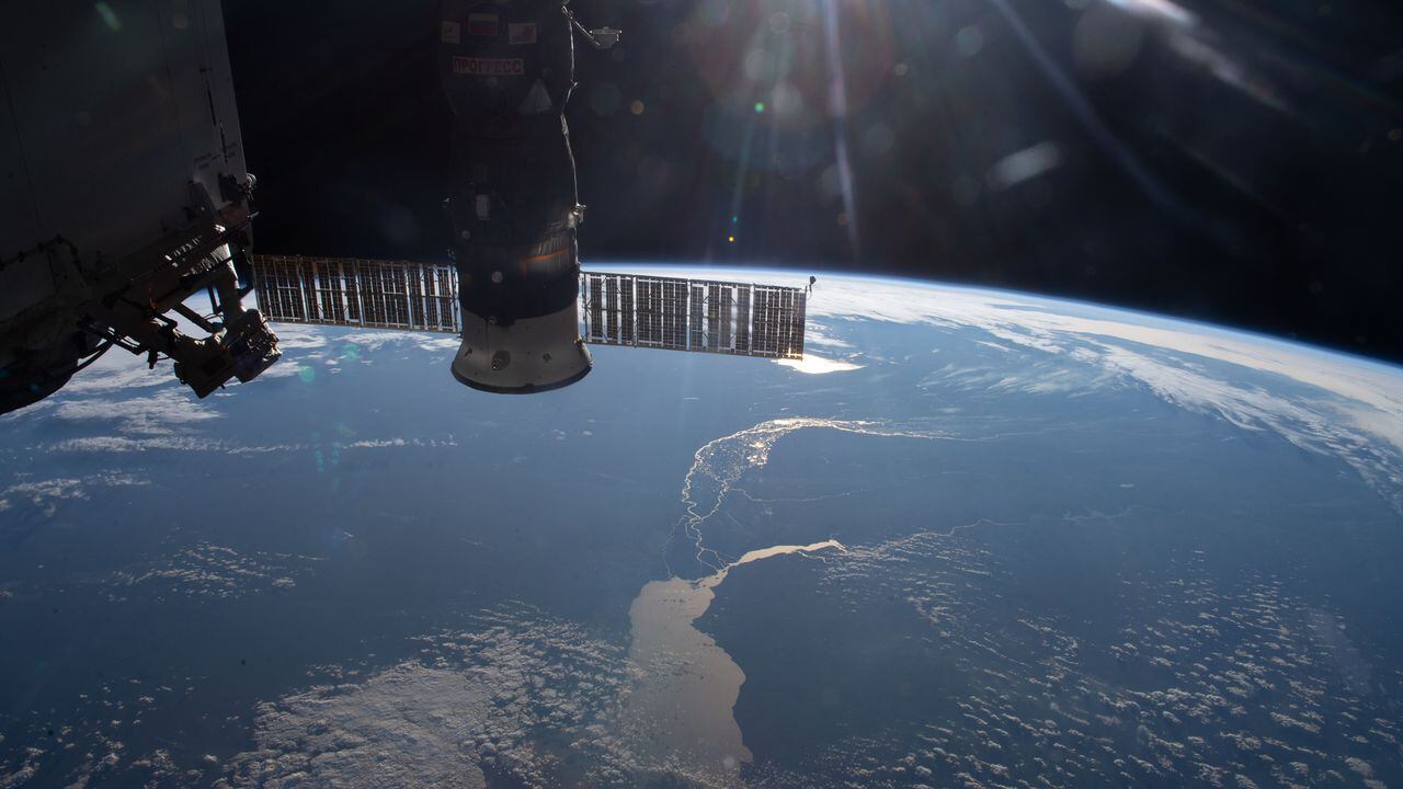 (June 28, 2020) --- The International Space Station, with the Progress 74 cargo craft in the foreground, orbited across South America and over the Atlantic Ocean when this photograph was taken of the Rio de la Plata that separates the nations of Argentina and Uruguay.