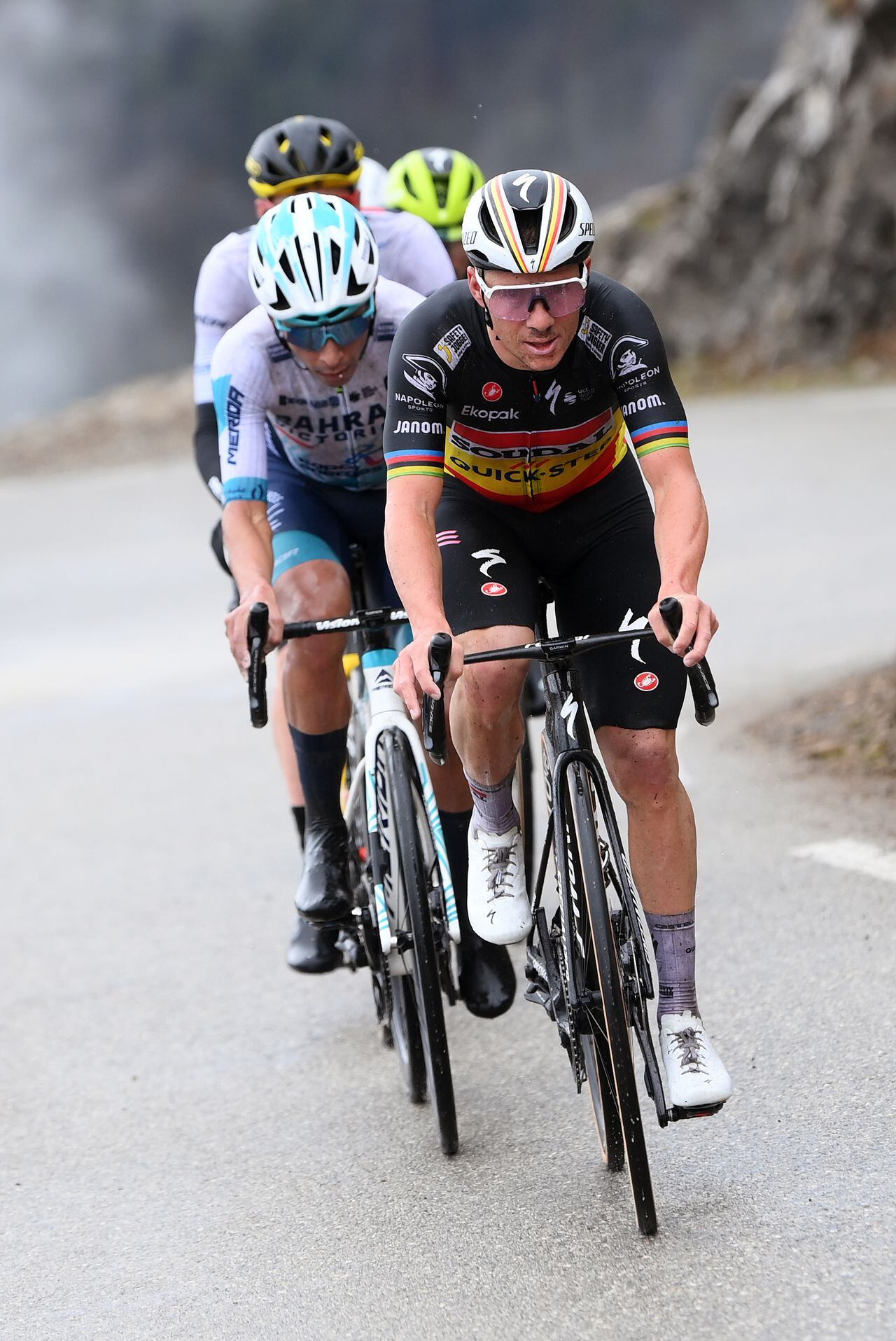 MADONE D'UTELLE, FRANCE - MARCH 09: (L-R) Santiago Buitrago of Colombia and Team Bahrain - Victorious and Remco Evenepoel of Belgium and Team Soudal - Quick Step compete in the chase group during the 82nd Paris - Nice 2024, Stage 7 a 103.7km stage from Nice to Madone d'Utelle 1166m / Route modified due to adverse weather conditions / #UCIWT / on March 09, 2024 in Madone d'Utelle, France. (Photo by Alex Broadway/Getty Images)