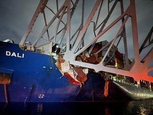 A view of the Dali cargo vessel which crashed into the Francis Scott Key Bridge causing it to collapse in Baltimore, Maryland, U.S., March 26, 2024.  BALTIMORE CITY FIRE DEPARTMENT RESCUE COMPANY/Handout via REUTERS    THIS IMAGE HAS BEEN SUPPLIED BY A THIRD PARTY. NO RESALES. NO ARCHIVES. MANDATORY CREDIT