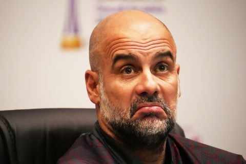 JEDDAH, SAUDI ARABIA - DECEMBER 18: Manchester City head coach Pep Guardiola speaks during the MD-1 press conference at King Abdullah Sports City on December 18, 2023 in Jeddah, Saudi Arabia. (Photo by Etsuo Hara/Getty Images)