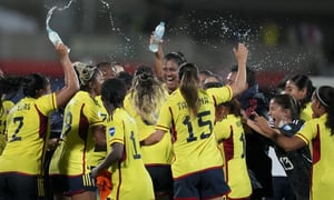 Colombia's players react after winning 1-0 against Argentina at the end of a women's Copa America semi final soccer match in Bucaramanga, Colombia , Monday, July 25, 2022. (AP Photo/Dolores Ochoa)
