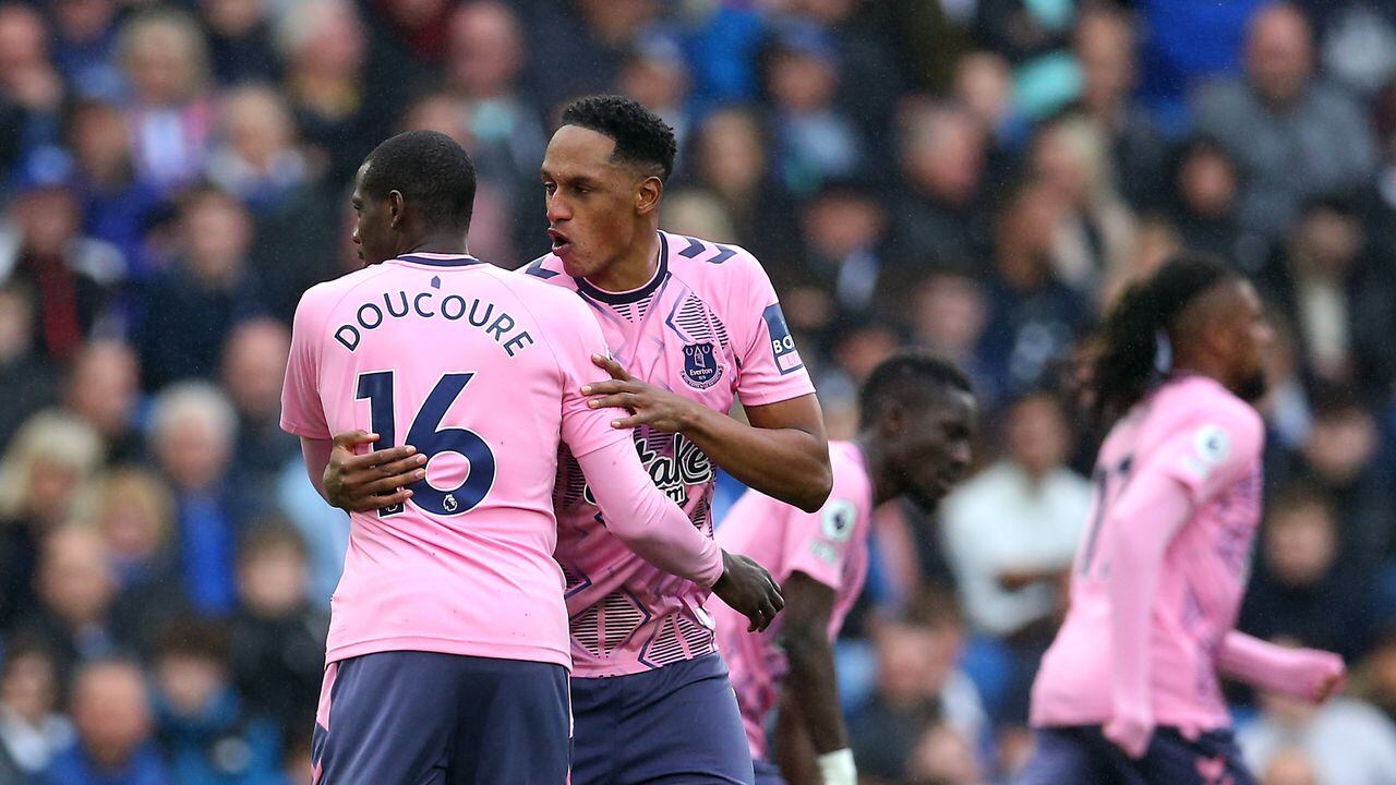 BRIGHTON, ENGLAND - MAY 08: Abdoulaye Doucoure of Everton celebrates with teammate Yerry Mina after scoring the team's first goal during the Premier League match between Brighton & Hove Albion and Everton FC at American Express Community Stadium on May 08, 2023 in Brighton, England. (Photo by Steve Bardens/Getty Images)