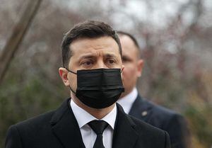 Ukrainian President Volodymyr Zelensky takes part at a commemoration ceremony at a monument of Heroes of Heavenly Hundred, activists who were killed during the anti-government protest the Euro Maidan revolution in 2014, in Kyiv, Ukraine on 21 November 2021. Ukrainians marks the anniversary of EuroMaidan revolution or Revolution of Dignity. (Photo by STR/NurPhoto via Getty Images)
