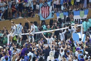 LUSAIL CITY, QATAR - DECEMBER 18: Players of Argentina celebrate the victory with fans after Argentina won the FIFA World Cup Qatar 2022 by beating France via penalty shoot-out at Lusail Stadium on December 18, 2022 in Lusail City, Qatar. (Photo by Fareed Kotb/Anadolu Agency via Getty Images)