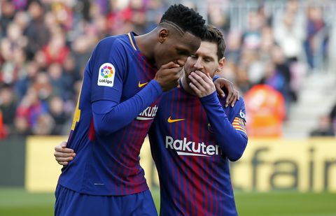 Yerry Mina and Leo Messi during the match between FC Barcelona and Getafe CF, for the round 23 of the Liga Santander, played at the Camp Nou Stadium on 11th February 2018 in Barcelona, Spain.  
 -- (Photo by Urbanandsport/NurPhoto via Getty Images)
