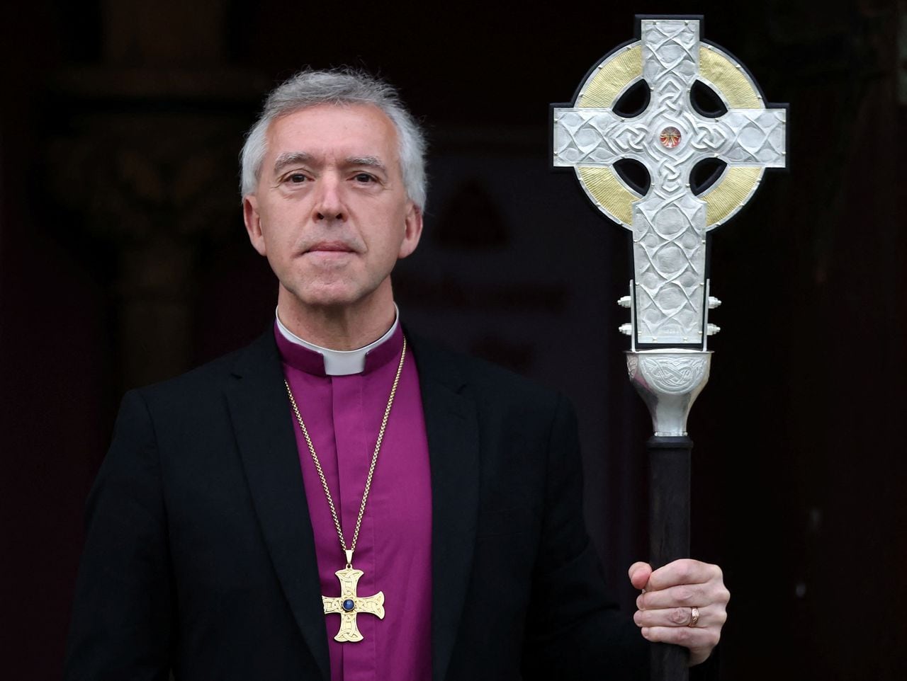 Archbishop of Wales Andrew John poses with the new Cross of Wales, which will be used in the procession during the Coronation of Britain’s King Charles, before a service at Holy Trinity Church in Llandudno, Britain April 19, 2023. REUTERS/Phil Noble