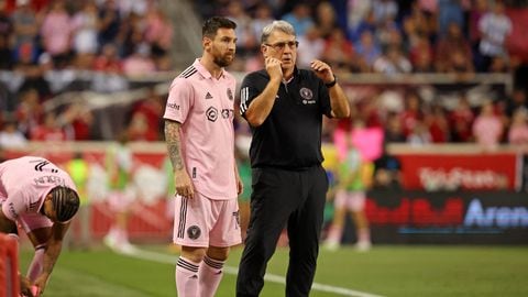 Aug 26, 2023; Harrison, New Jersey, USA; Inter Miami CF forward Lionel Messi (10) talks with head coach Gerardo Martino before being put into the game New York Red Bulls during the second half at Red Bull Arena. Mandatory Credit: Vincent Carchietta-USA TODAY Sports