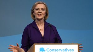 British lawmaker Liz Truss speaks after winning the Conservative Party leadership contest at the Queen Elizabeth II Centre in London, Monday, Sept. 5, 2022. Liz Truss will become Britain's new Prime Minister after an audience with Britain's Queen Elizabeth II on Tuesday Sept. 6. (AP Photo/Alberto Pezzali)