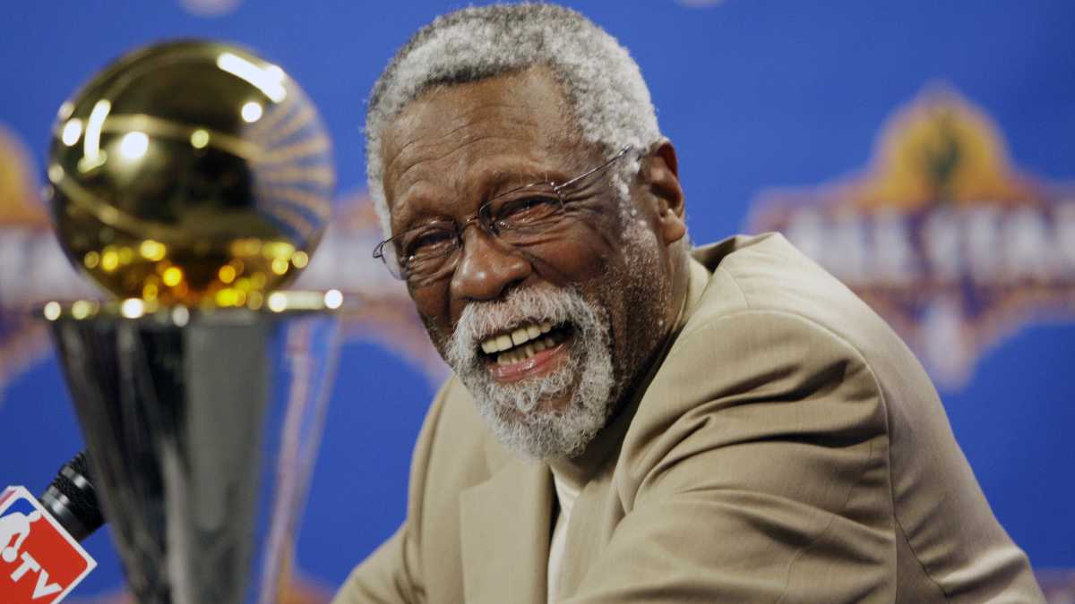 FILE - NBA great Bill Russell reacts at a news conference as he learns the most valuable player award for the NBA basketball championships has been renamed the Bill Russell NBA Finals Most Valuable Player Award, Feb. 14, 2009, in Phoenix. Russell has died at age 88. His family said on social media that Russell died on Sunday, July 31, 2022. Russell anchored a Boston Celtics dynasty that won 11 titles in 13 years. (AP/Matt York, file)