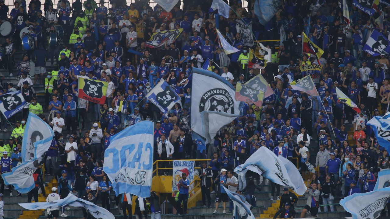 Millonarios fans support their team during the Colombian BetPlay League match between Millonarios and Independiente Santa Fe at Estadio Nemesio Camacho in Bogota, Colombia on April 24, 2022. Final score 2-1. (Photo by Daniel Garzon Herazo/NurPhoto via Getty Images)