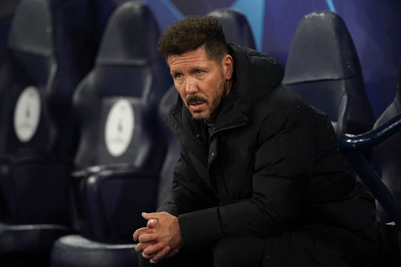 Atletico Madrid's head coach Diego Simeone attends the Champions League, first leg, quarterfinal soccer match between Manchester City and Atletico Madrid at the Etihad Stadium, in Manchester, Tuesday, April 5, 2022. (AP Photo/Dave Thompson)