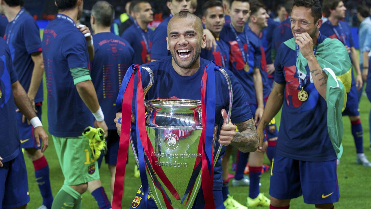 (L-R) Dani Alves of FC Barcelona with Champions League trophy, Adriano of FC Barcelona during the UEFA Champions League final match between Barcelona and Juventus on June 6, 2015 at the Olympic stadium in Berlin, Germany.(Photo by Getty Images/VI Images)