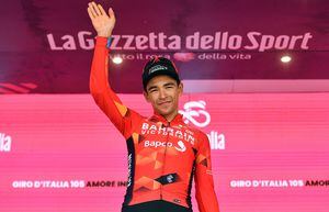 Cycling - Giro d'Italia - Stage 17 - Ponte di Legno to Lavarone, Italy - May 25, 2022 Bahrain - Victorious' Santiago Buitrago celebrates on the podium after winning stage 17 REUTERS/Jennifer Lorenzini