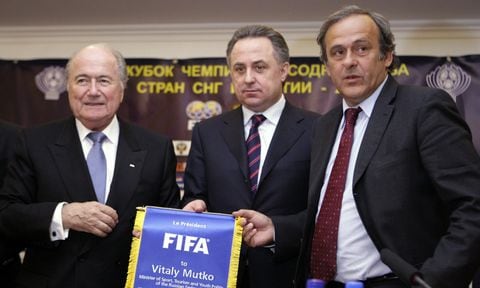 Then FIFA president Sepp Blatter, Russian Sports Minister Vitaly Mutko, who was the Russian Football Union president in 2005-2009, and then UEFA president Michel Platini are seen in Moscow. Former FIFA officials Sepp Blatter and Michel Platini will go on trial charged with fraud and other offenses in June, it was announced Tuesday, April 12, 2022. Switzerland’s federal criminal court says the trial will be heard before a panel of three judges on 11 days between June 8 and 22. (AP , file)
