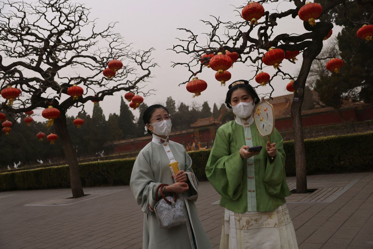 En imágenes : Tormenta de arena y contaminación en los cielos de Beijing