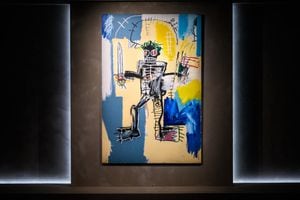 US artist Jean-Michel Basquiat's 1982 painting, 'Warrior' is seen displayed at the Christies auction house showroom in Hong Kong on March 22, 2021, which is estimated at between 240,000,000 - 320,000,000 HKD (31,000,000 - 41,000,000 USD), and will be auctioned in a livestreamed, single-lot evening sale entitled 'We Are All Warriors - The Basquiat Auction', as part of Christie's Spring Season of 20th Century sales. (Photo by Anthony WALLACE / AFP) / RESTRICTED TO EDITORIAL USE - MANDATORY MENTION OF THE ARTIST UPON PUBLICATION - TO ILLUSTRATE THE EVENT AS SPECIFIED IN THE CAPTION