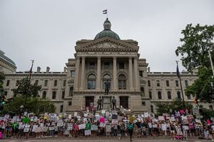 INDIANAPOLIS, IN - JULY 25: Protesters gather outside of Indiana State Capitol building on July 25, 2022 in Indianapolis, Indiana. Activists are gathering during a special session of the Indiana state Senate concerning abortion access in the state. (Photo by Jon Cherry/Getty Images)