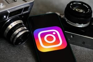 Instagram logo displayed on a phone screen and old cameras are seen in this illustration photo taken in Krakow, Poland on August 21, 2021. (Photo Illustration by Jakub Porzycki/NurPhoto via Getty Images)