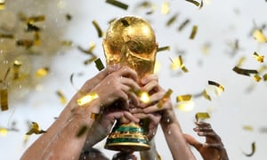 FILES) This file photo taken on July 15, 2018 France's players lifting the Fifa World Cup trophy after the Russia 2018 World Cup final football match between France and Croatia at the Luzhniki Stadium in Moscow. Four years after France's victory, football is waiting for its new master at the 2022 World Cup. But the contenders, Brazil, Argentina and France, are afraid of getting bogged down in the atypical World Cup in Qatar, which promises to be full of surprises.
Jewel SAMAD / AFP