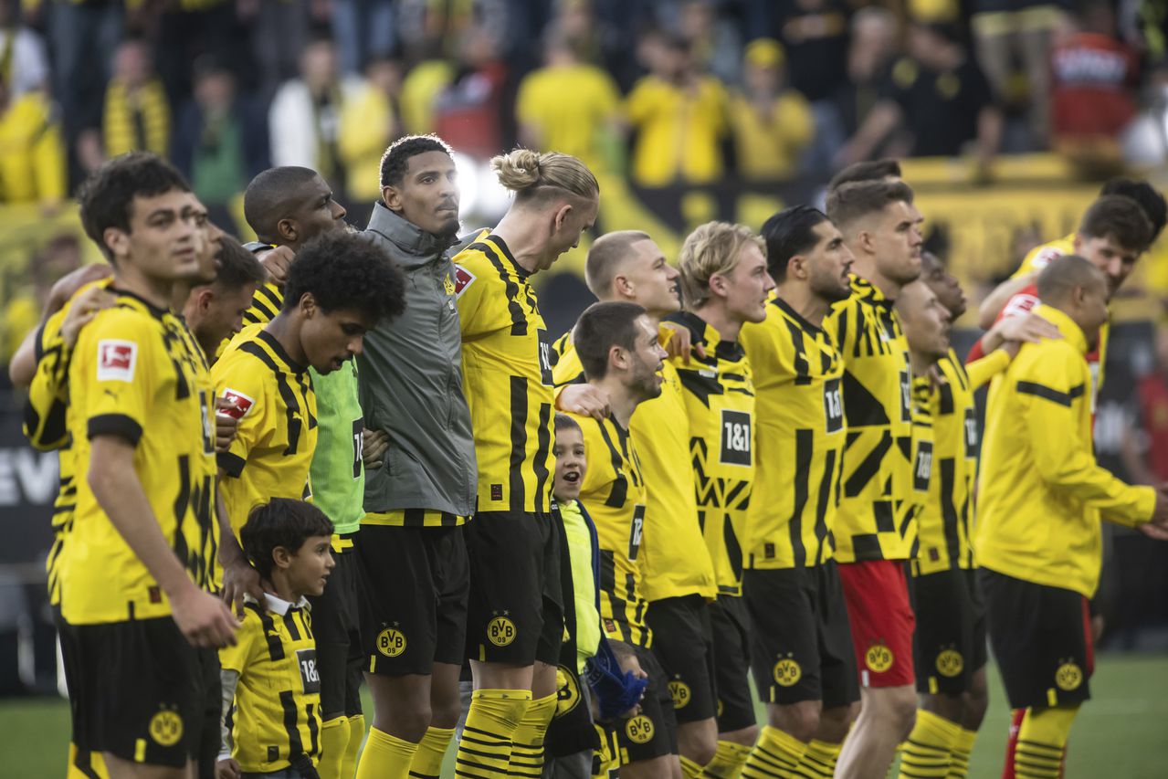 Dortmund's players celebrate at the end of the German Bundesliga soccer match between Borussia Dortmund and Borussia Moenchengladbach in Dortmund, Germany, Saturday, May 13, 2023. (AP/Bernd Thissen/dpa)