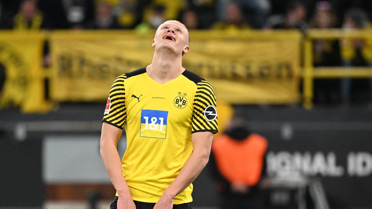 Dortmund's Norwegian forward Erling Braut Haaland reacts during  the German first division Bundesliga football match Borussia Dortmund v Arminia Bielefeld in Dortmund, western Germany, on March 13, 2022. (Photo by Ina FASSBENDER / AFP) / DFL REGULATIONS PROHIBIT ANY USE OF PHOTOGRAPHS AS IMAGE SEQUENCES AND/OR QUASI-VIDEO
