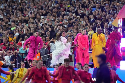 Camila Cabello performs ahead of the Champions League final soccer match between Liverpool and Real Madrid at the Stade de France in Saint Denis near Paris, Saturday, May 28, 2022. (AP Photo/Petr David Josek)