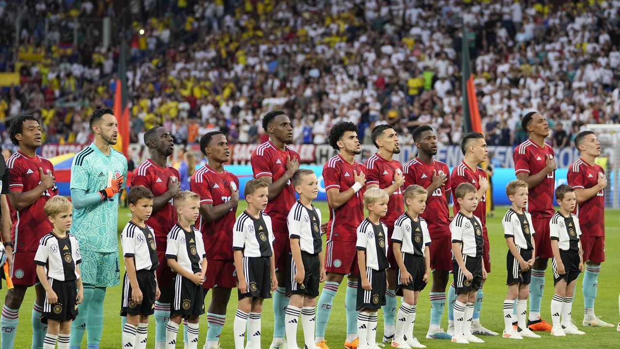 Colombia national team players sing the national anthem ahead of an international friendly soccer match between Germany and Colombia at Veltins-Arena, in Gelsenkirchen, Germany, Tuesday, June 20, 2023. (AP Photo/Martin Meissner)