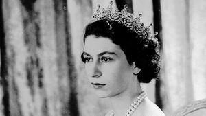 FILE - Britain's Queen Elizabeth II, then Princess Elizabeth, wears a silver gown with a diamond tiara and pearl necklace, in this Aug. 30, 1949 photo. (AP Photo, File)