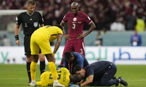 Ecuador's Enner Valencia is being treated after and injury during the World Cup group A soccer match between Qatar and Ecuador at the Al Bayt Stadium in Al Khor ,Qatar, Sunday, Nov. 20, 2022. (AP Photo/Darko Bandic)
