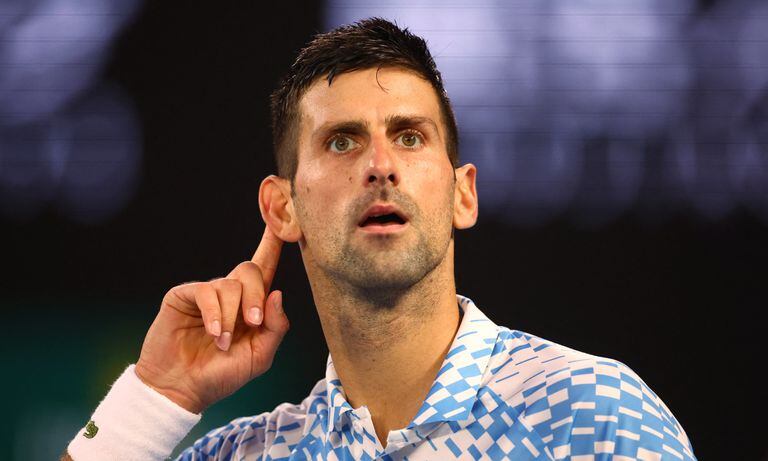 Tennis - Australian Open - Melbourne Park, Melbourne, Australia - January 27, 2023 Serbia’s Novak Djokovic reacts during his semi final match against Tommy Paul of the U.S. REUTERS/Carl Recine