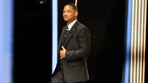 HOLLYWOOD, CA - March 27, 2022: Will Smith holds his Oscar for best actor for King Richard during the show at the 94th Academy Awards at the Dolby Theatre at Ovation Hollywood on Sunday, March 27, 2022.  (Robert Gauthier / Los Angeles Times via Getty Images)