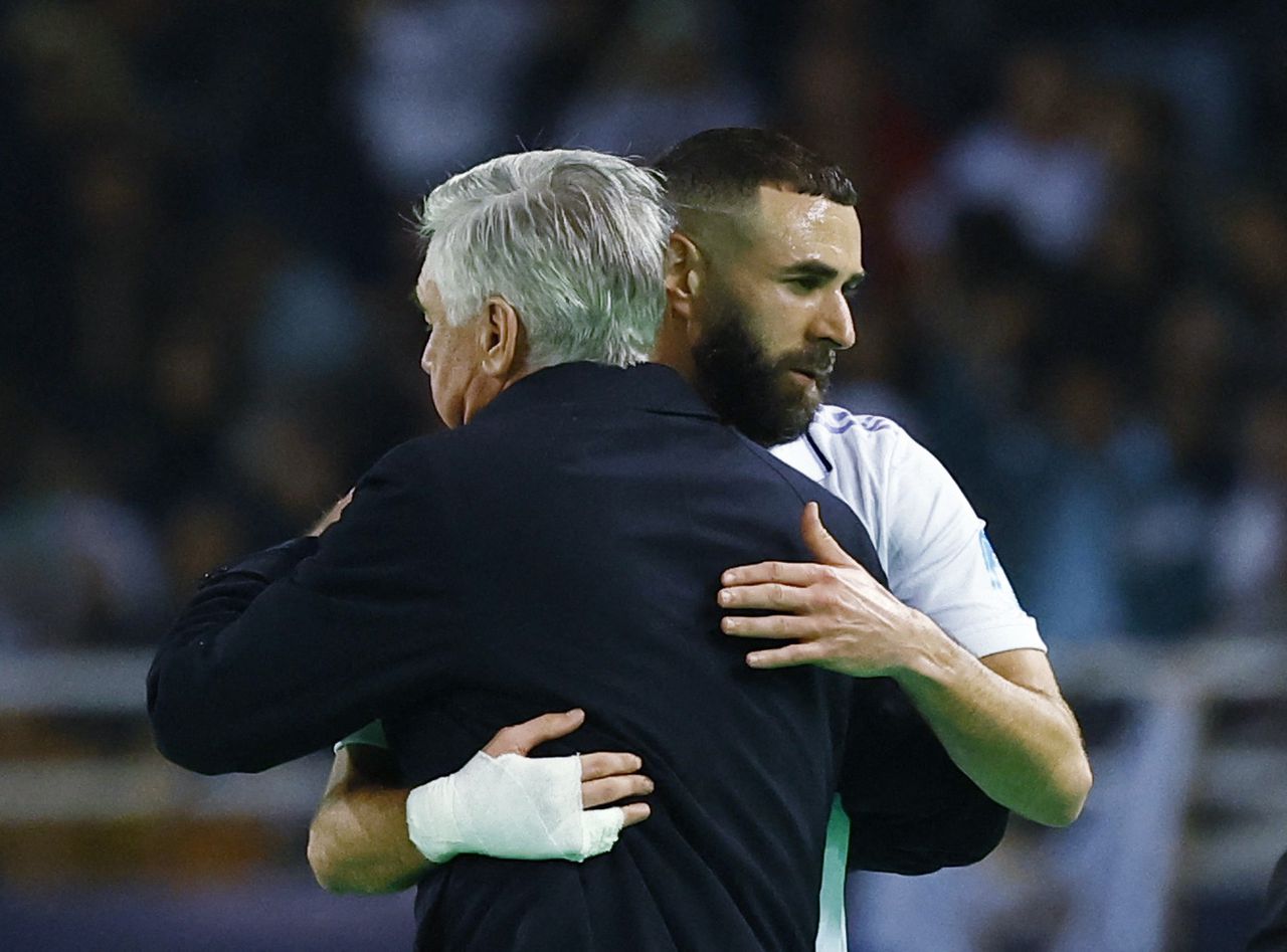 Soccer Football - FIFA Club World Cup - Final - Real Madrid v Al Hilal - Prince Moulay Abdellah Stadium, Rabat, Morocco - February 11, 2023  Real Madrid's Karim Benzema with coach Carlo Ancelotti after being substituted REUTERS/Susana Vera
