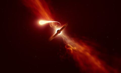 Captan agujero negro succionando una estrella cercana
