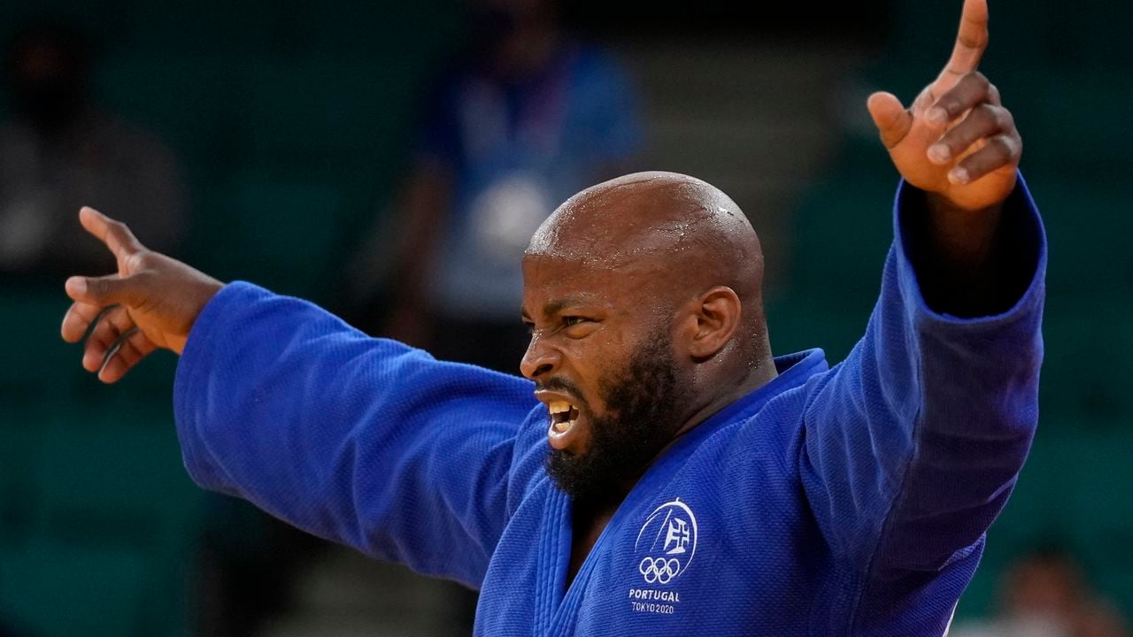 Jorge Fonseca of Portugal reacts after defeating Shady Elnahas of Canada, unseen, in one of the men's -100kg bronze medal Judo match of the 2020 Summer Olympics in Tokyo, Japan, Thursday, July 29, 2021. (AP Photo/Vincent Thian)