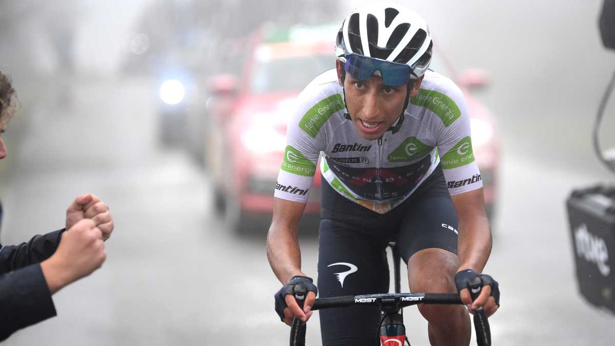 LAGOS DE COVADONGA, SPAIN - SEPTEMBER 01: Egan Arley Bernal Gomez of Colombia and Team INEOS Grenadiers White Best Young Rider Jersey competes in the mist while fans cheer during the 76th Tour of Spain 2021, Stage 17 a 185,5km stage from Unquera to Lagos de Covadonga 1.085m / @lavuelta / #LaVuelta21 / on September 01, 2021 in Lagos de Covadonga, Spain. (Photo by Getty Images/Tim de Waele)
