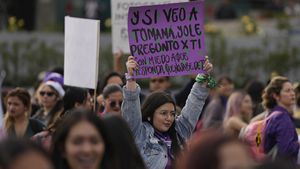 Women march marking International Women's Day in Bogota, Colombia, Wednesday, March 8, 2023. (AP Photo/Fernando Vergara)